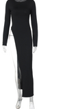 Black long-sleeve dress on a mannequin with 'Dulzura' branding.
