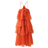 Orange tiered dress with thin straps on a white background