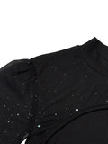 Black sweater with star pattern on a white background